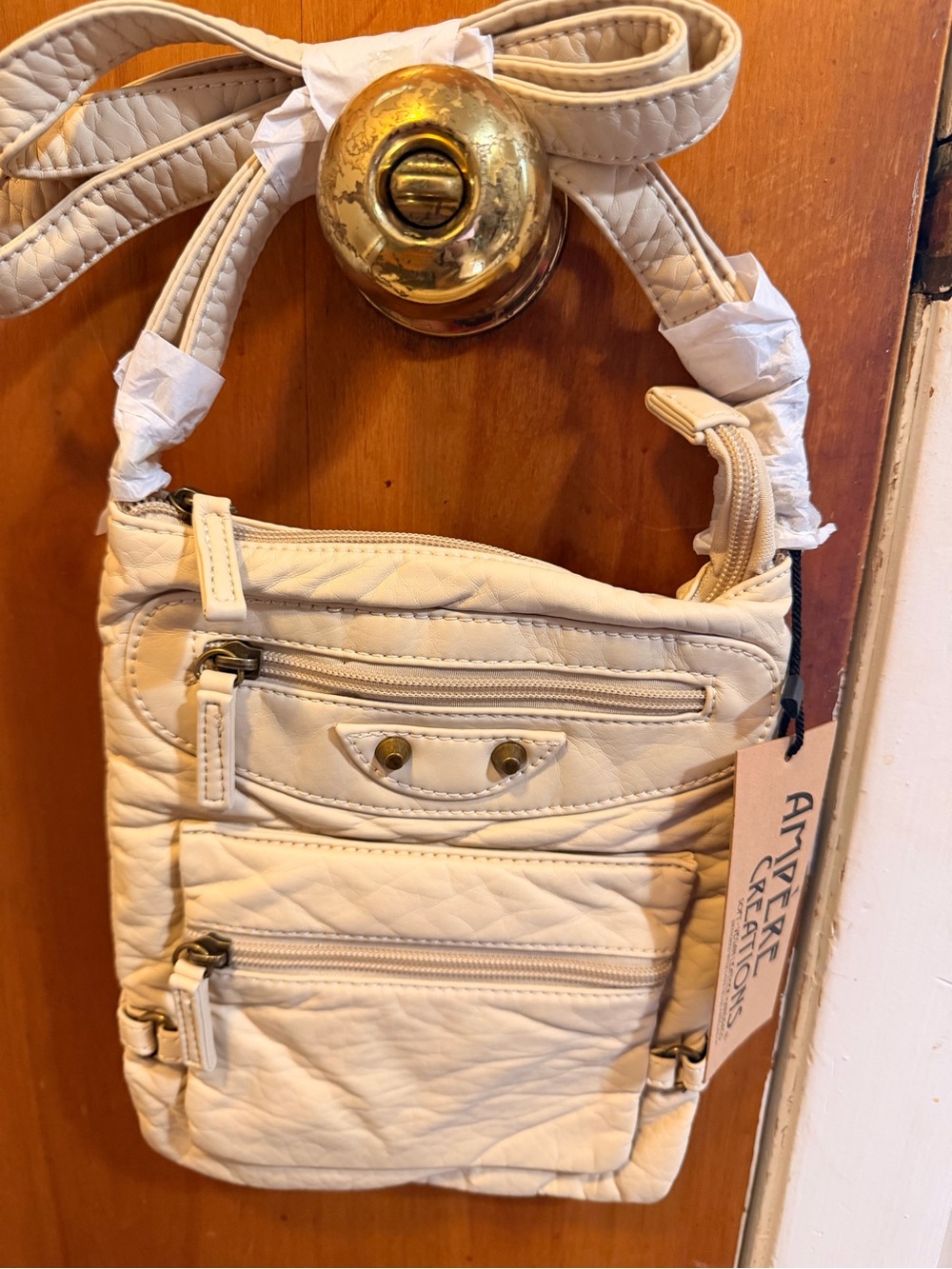 Cream Quilted Crossbody Bag with Front Zip Pockets by